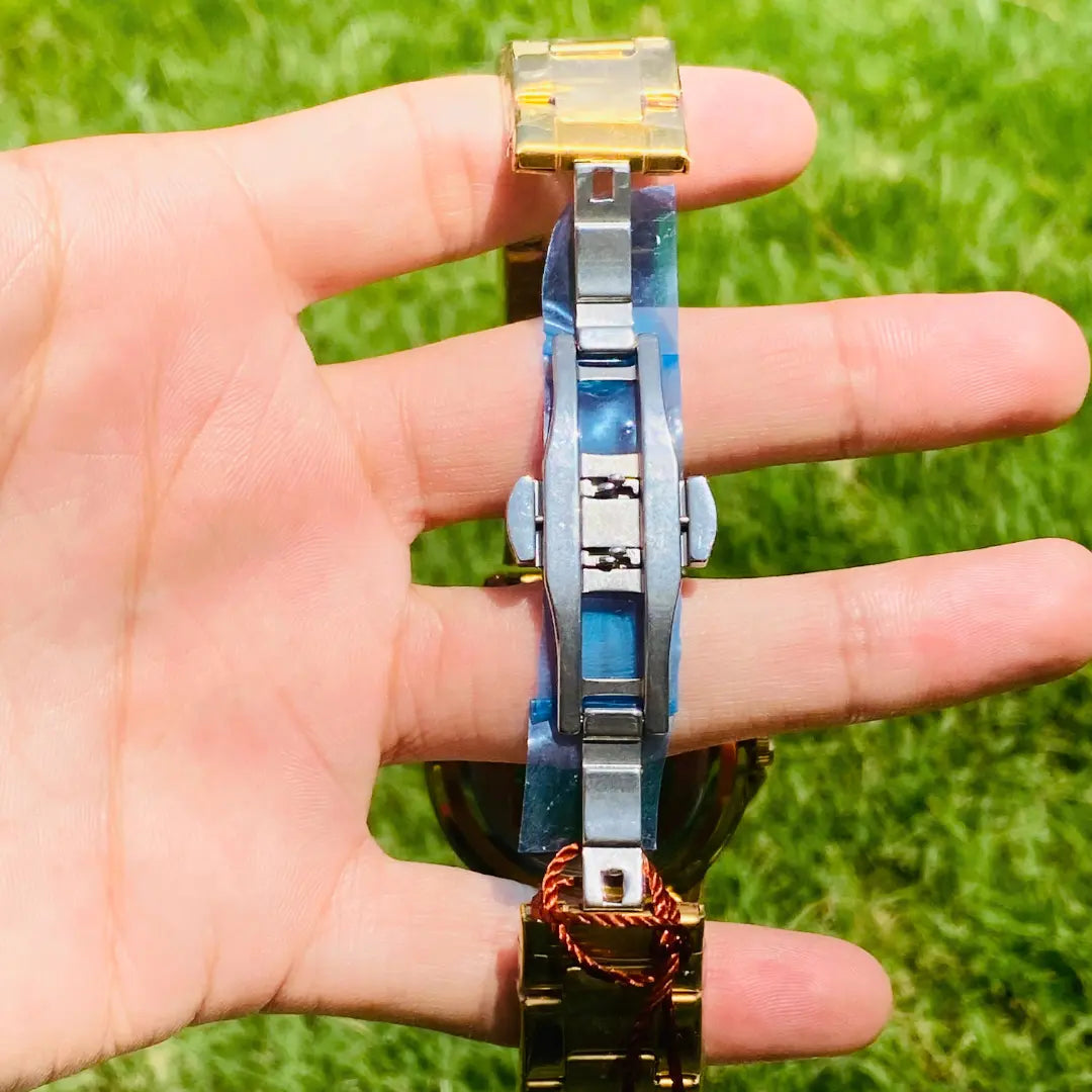 RLX  Submariner Gold with Green Dial